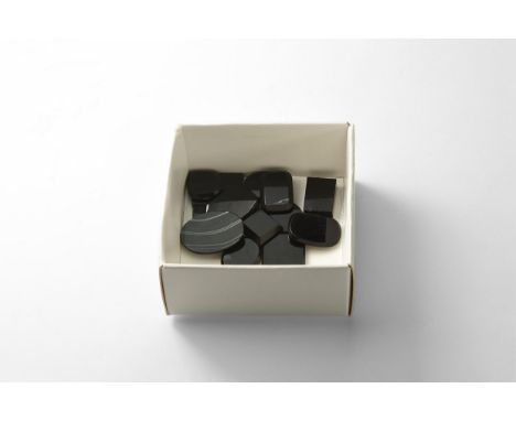 A group of fourteen finely cut and polished black onyx gem of rectangular and oval shape.  10 grams total, 11-20mm (1/2 - 3/4