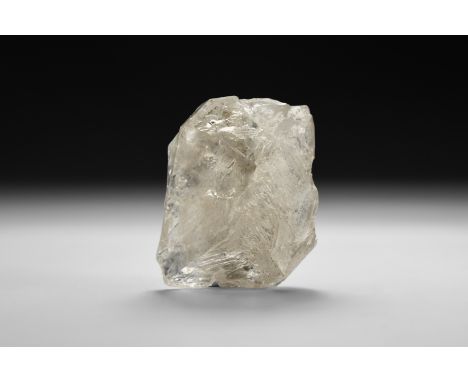 A fine specimen of a fenster quartz with rainbow reflections, in white card tray with label reading: 'Fenster quartz elestial