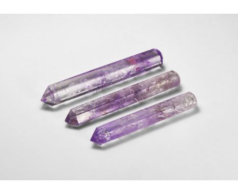 A group of three cut and polished amethyst crystal points or massage tools.  90 grams total, 8.5-10cm (3 1/4 - 4"). From a hi