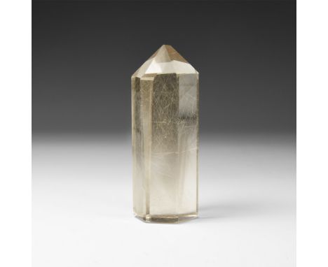 A fine smoky quartz crystal with hair-like needles of rutile scattered throughout.  122 grams, 83mm (3 1/4"). From a historic