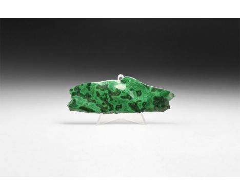 A cut and polished malachite sheet with dark and pale green colour patterns.  81 grams, 12cm (4 3/4"). From a historic ‘Victo