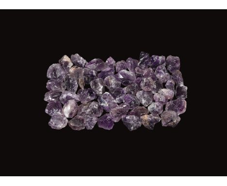 A group of fifty large amethyst chunks of dark and pale purple colour.  3 kg total, 38-57mm (1 1/2 - 2 1/4"). From a historic