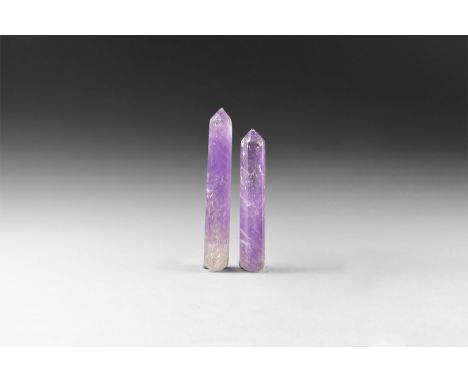 A pair of two cut and polished lilac amethyst obelisks or 'massage tools' with rainbow reflections, in white card tray.  92 g
