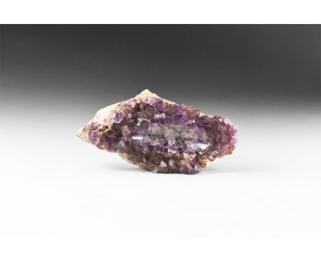 A matrix with dark purple amethyst crystals to one side with polished 'bowl' section to the centre.  636 grams, 17cm (6 3/4")