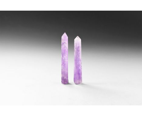 A pair of two cut and polished lilac amethyst obelisks or 'massage tools' with rainbow reflections, in white card tray.  78 g