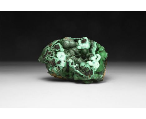 A fine specimen of botryoidal and crystalline malachite, with numerous bubble-like structures to the front of the specimen; i