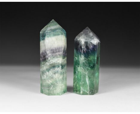 A pair of fluorite crystal points with bands of green, white and purple colour.  355 grams total, 85-90mm (3 1/4 - 3 1/2"). F