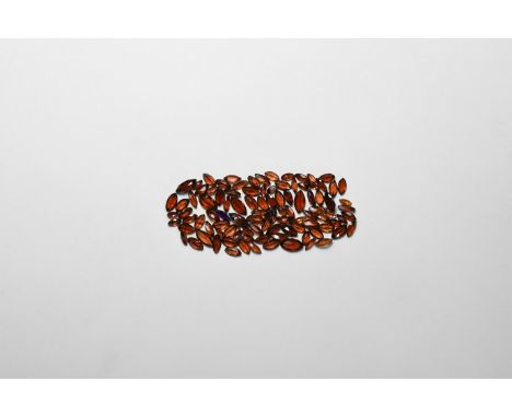 A group of five hundred marquise-cut garnets of a deep red-brown colour.  7.24 grams total, 4-8mm (36.2 carats) (1/4"). From 