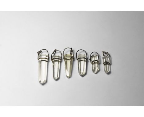 A group of six quartz crystals, each with a white metal cage and suspension loop.  28 grams total, 40-58mm (1 1/2 - 2 1/4"). 