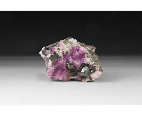 A fine specimen of galena with purple cubic fluorite crystals, in white card tray.  85 grams, 75mm (3"). From a historic ‘Vic