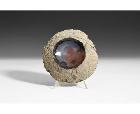 A discoid tray formed from a polished agate geode section with scooped centre.  196 grams, 10cm (4"). From a historic ‘Victor