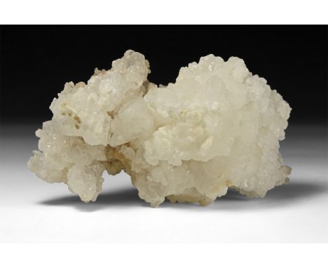 A fine specimen of cave-growth calcite forming numerous spherical aggregates, giving the appearance of popcorn.  377 grams, 1