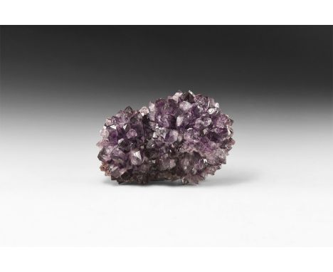 A fine specimen of two joined, knob-shaped 'porcupines' of amethyst crystals.  629 grams, 11.6cm (4 1/2"). From a historic ‘V