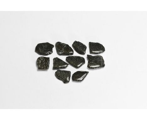 A group of ten fine cut and polished specularite specimens, each in a white card tray.  180 grams total, 35-42mm (1 1/2"). Fr