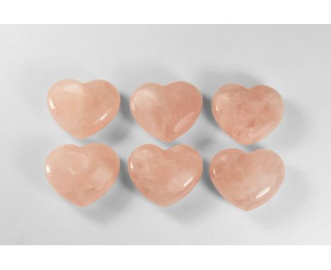 A group of six polished large pink quartz hearts; each in white card box.  345 grams total, 45mm (1 3/4"). From a historic ‘V
