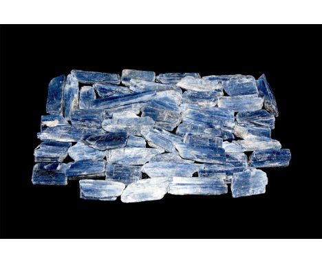 A group of fifty pale blue and white kyanite specimens, from Brazil.  1.1 kg total, 32-55mm (1 1/4 - 2 1/4"). From a historic