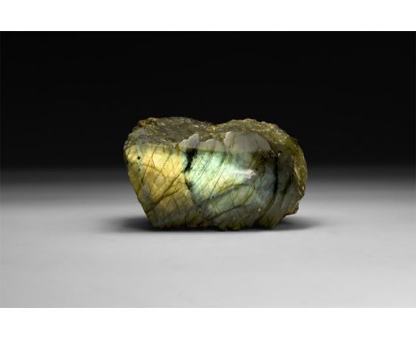 A fine display specimen of labradorite polished to one side, with yellow and green 'schiller'.  529 grams, 87mm (3 1/2"). Fro