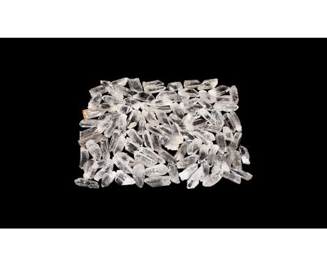 A group of one hundred transparent quartz crystals from Brazil.  783 grams, 30-47mm (1 1/4 - 1 3/4"). From a historic ‘Victor