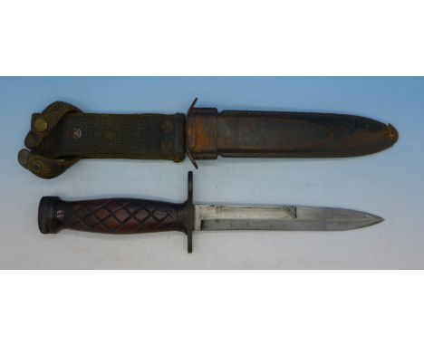 A U.S. M8 bayonet and scabbard