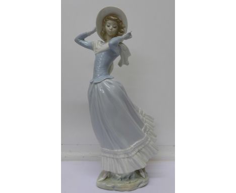 A Lladro figure, left hand restored, 35cm