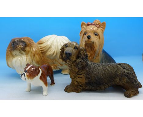 Four dog figures, Beswick Bosun bulldog, Coopercraft, Sylvac and one Italian