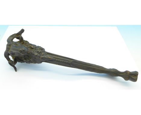 A door knocker in the form of a ram