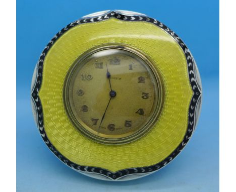 A silver and yellow enamel 8-days dressing table clock, Birmingham 1925, diameter 84mm