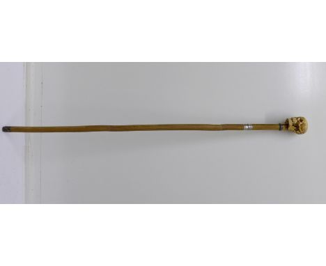 An early 20th Century sword stick with later applied top, the silver mount hallmarked London 1927