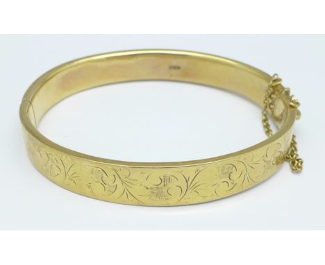 A 9ct gold bangle, 12.2g