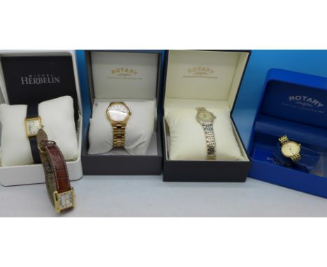 Three Rotary wristwatches and two other wristwatches
