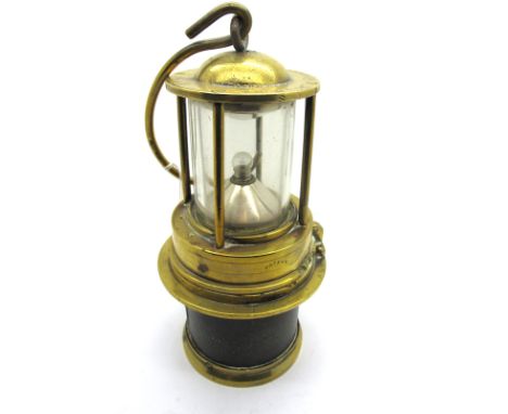 The Thomson Rothwell Lamp Brass Miner's Safety Lamp, fitted with a bulb, 32cm high (including suspension hook).