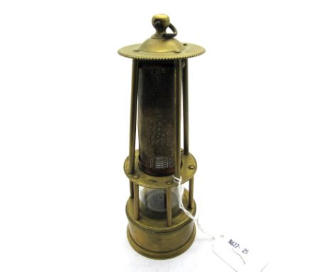 A Small Brass Miner's Safety Lamp, the upper and lower section with four and six columns respectively, 18cm high (including s