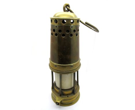 A Davis Derby Brass Miner's Safety Lamp, with part pierced bonnet, 34cm high (including suspension hook).