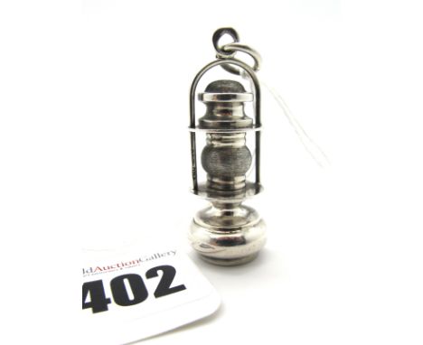 A Novelty Oil Lamp Charm Pendant, stamped "925", 4.5cm high (excluding suspension loop).