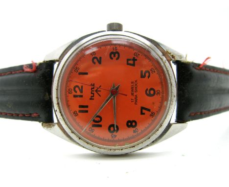 A Vintage HMT Military Wristwatch, 17 jewels, orange face with HMT and arrow, stainless steel case with arrow and No. 050486,