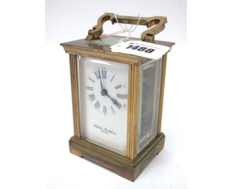A Devon Clocks Limited 'Charles Frodsham' Brass Cased Carriage Clock, with fluted sides, the white dial with Roman numerals, 