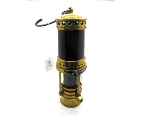 A Brass and Black Painted Metal Miner's Safety Lamp, 34.5cm high (including suspension hook).