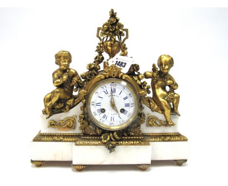 Raingo Fres á Paris, A Late XIX Century Ormolu and White Marble Mantel Clock, the white enamel dial with blue and black numer