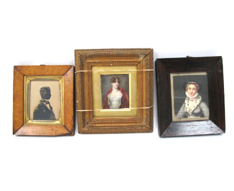 A Mid XIX Century Silhouette of a Gentleman, maple work frame, 10 x 7.5cm; A Portrait of a Lady, wearing a ruffled white blou