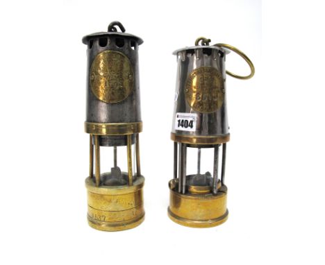 A Protector Lamp and Lighting Co. Ltd., Eccles, Type GR6 S M and Q Brass and Aluminium Miners Safety Lamp, 32cm high to the t