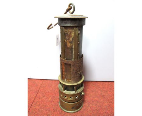 A Brass Miner's Safety Lamp, with sliding gauge, stamped "4L 1", 45cm high (including suspension hook).