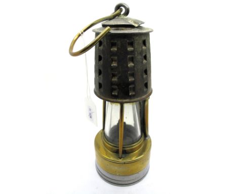 An Aluminium and Brass Miner's Safety Lamp, with corrugated bonnet, 30cm high (including suspension hook).