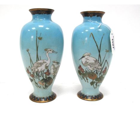 A Pair of Japanese Late XIX Century Cloisonné Enamel Vases, of ovoid form, decorated with cranes amongst foliage against a tu