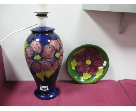 A Moorcroft Pottery Table Lamp, of baluster form, painted in the 'Anemone' pattern against a dark blue ground, impressed mark