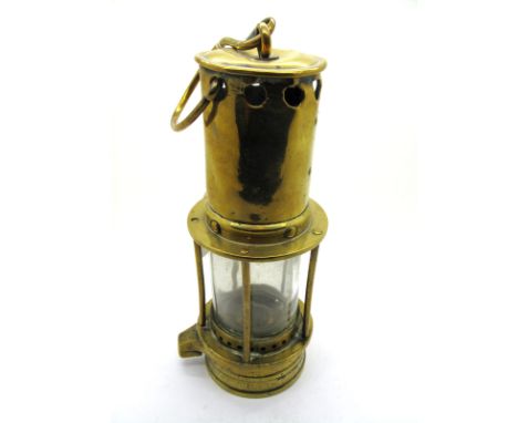 A Brass Miner's Safety Lamp, 31cm high (including suspension hook).