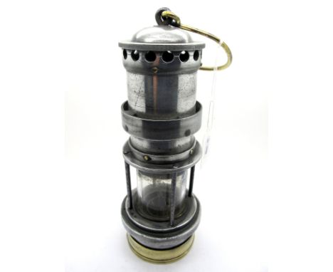 An Aluminium and Brass Miner's Safety Lamp, 34cm high (including suspension hook) (unmarked).