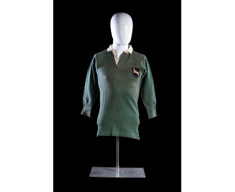 A RARE 1906 SOUTH AFRICA INTERNATIONAL SPRINGBOK RUGBY UNION MATCH-WORN JERSEYIn moss-green cotton with white collars, three 