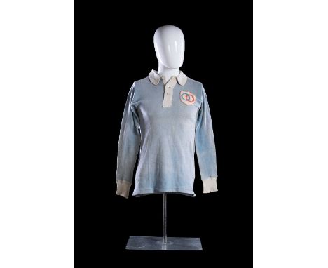 A RARE 1910 FRENCH INTERNATIONAL RUGBY UNION MATCH-WORN JERSEY BEARING OLYMPIC RING CRESTPale blue with white collars having 