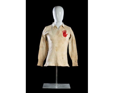 A 1912 ULSTER RUGBY UNION JERSEY MATCH-WORN VERSUS LEINSTERIn all white and bearing silk square with red hand crest, old labe