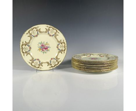A delightful set of 11 pastel yellow plates, each adorned with shimmering art accents and exquisite floral arrangements. Mark